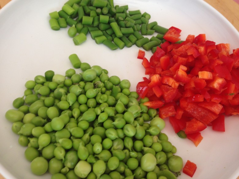 Peas, peppers, and garlic scapes