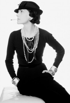 Coco Chanel / photographed by Man Ray.  Wearing the Maltese Cross Cuffs made for her by Duke Fulco di Verdura.