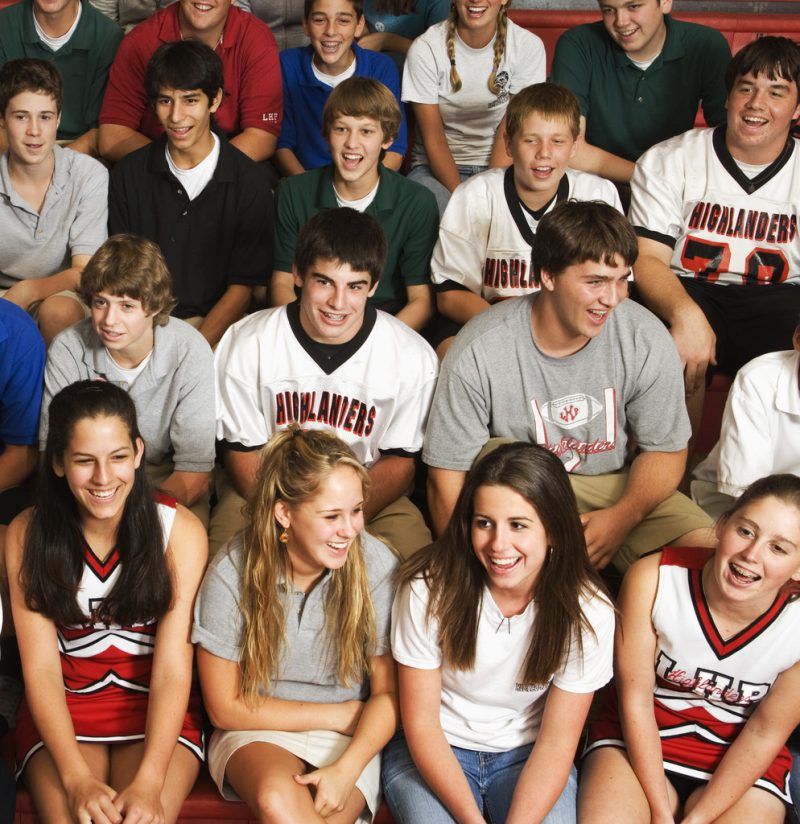 High School Students Sitting in Bleachers UrbanMoms